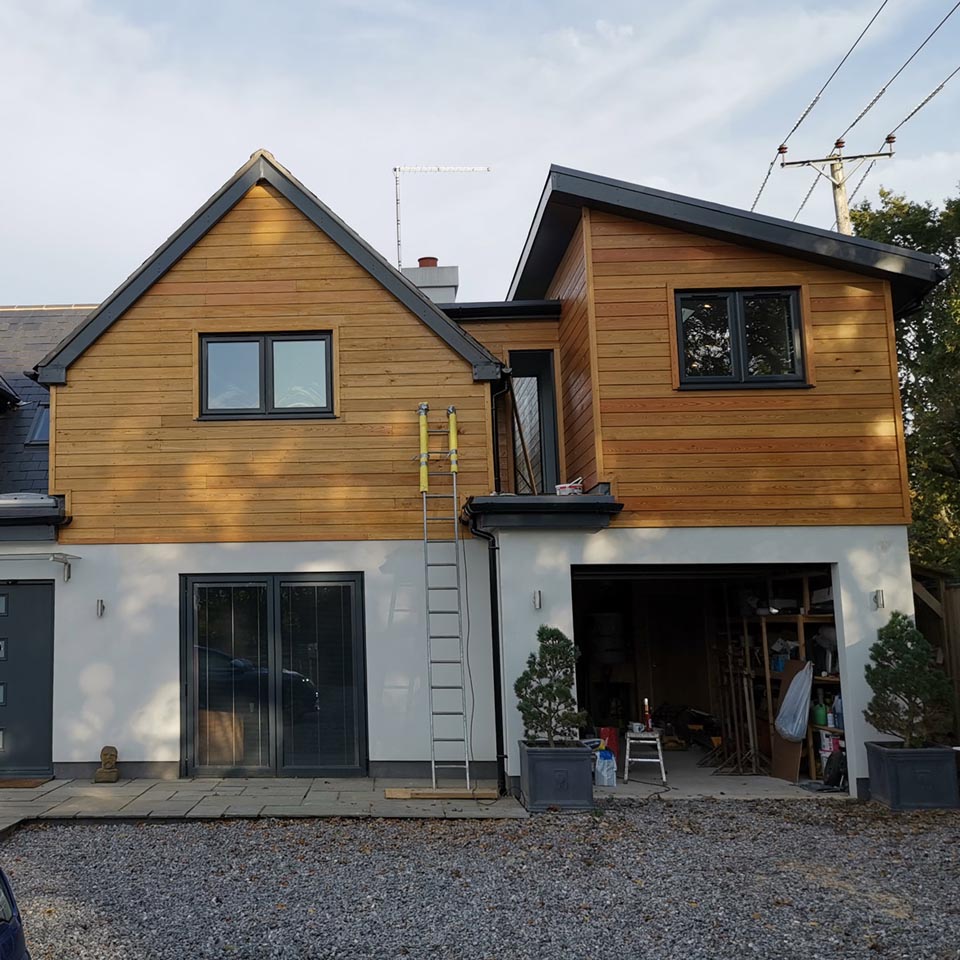 New build, ground work, modern rebuild and extension with wooden cladding